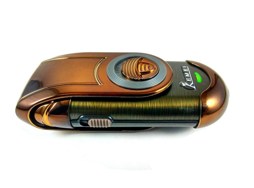 Kemei เครื่องโกนหนวดไฟฟ้าขนาดพกพา แบบชาร์จไร้สาย พร้อมที่กันจอน KM-Q788 มีใบมีดสำรอง - สีทอง