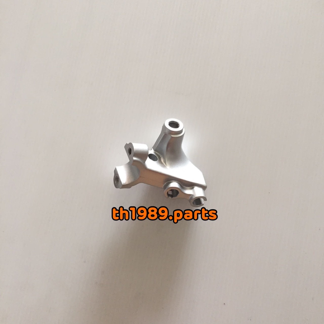 ขาจับมือเบรคหลัง สำหรับรุ่น Jelato125 UF125F-H อะไหล่แท้ SUZUKI 57511-13H10-000