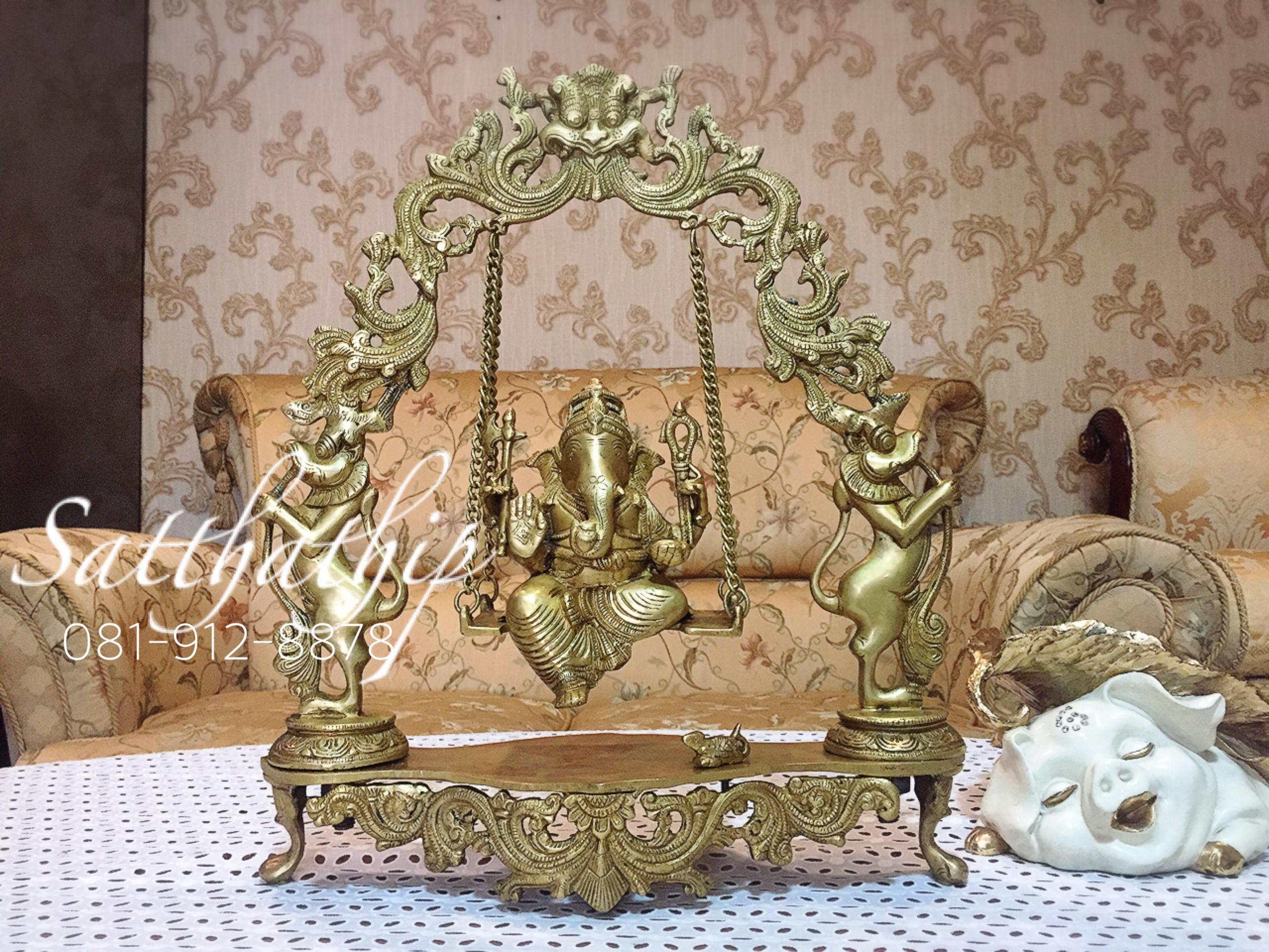 พระพิฆเนศปางโล้ชิงช้า นั่งชิงช้า (ทองเหลือง) ผลิตและนำเข้าจากอินเดีย - Ganesha: Lord of Success