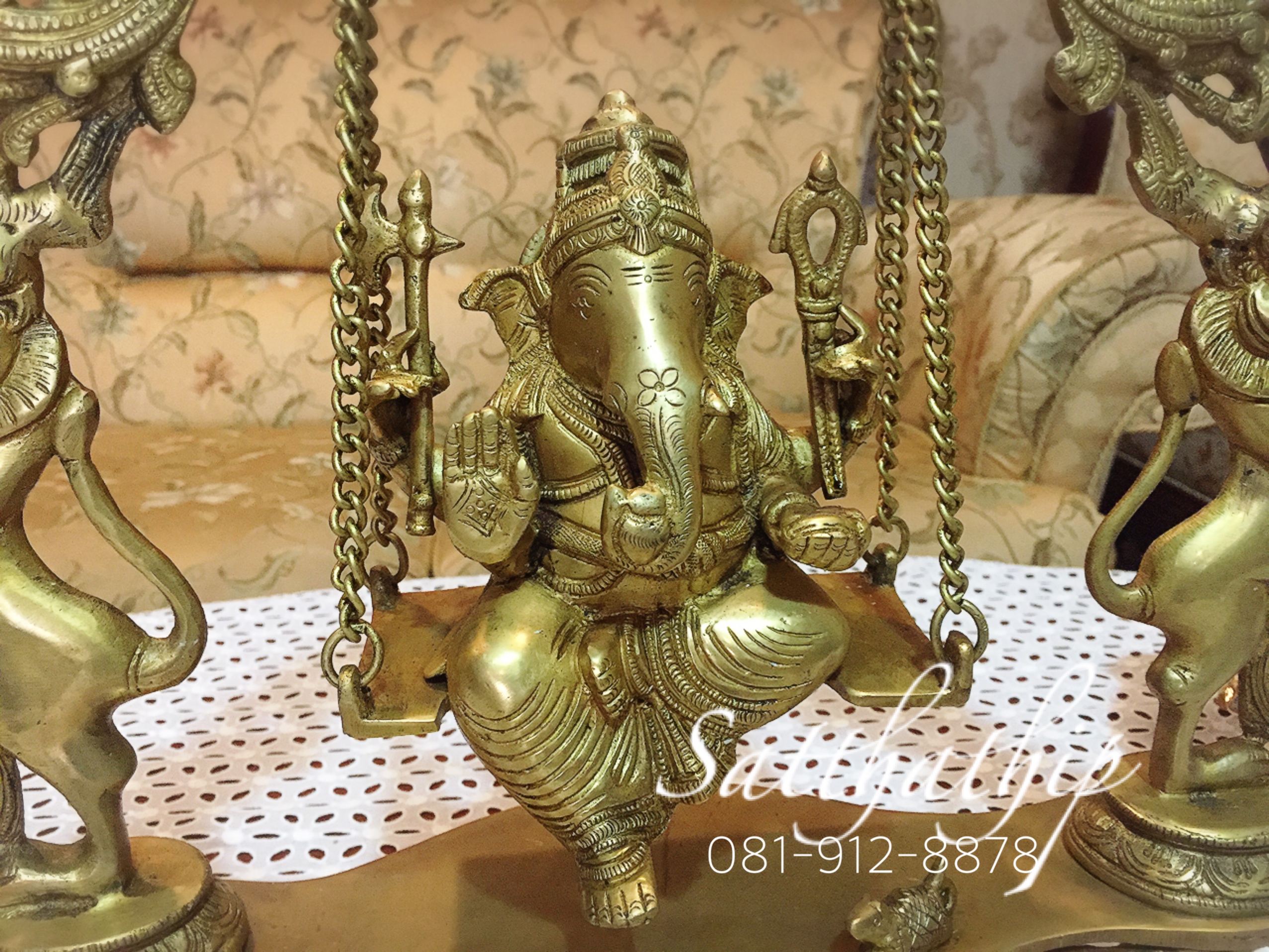 พระพิฆเนศปางโล้ชิงช้า นั่งชิงช้า (ทองเหลือง) ผลิตและนำเข้าจากอินเดีย - Ganesha: Lord of Success