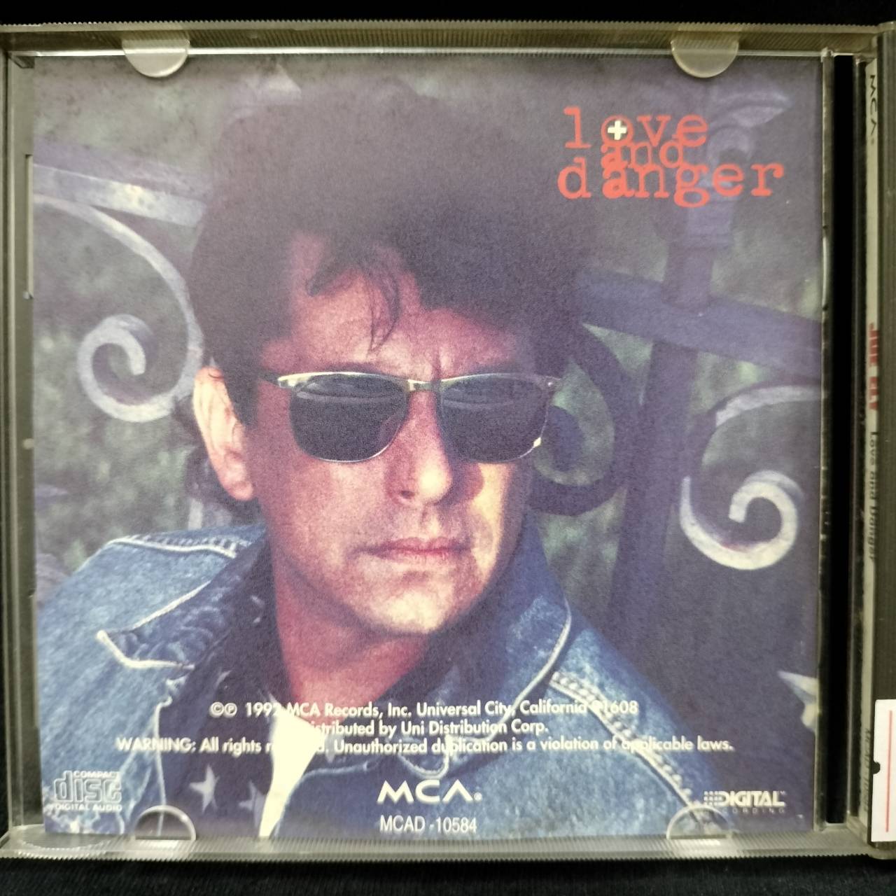 Joe Ely – Love And Danger / USA / ปกเก่าเก็บ / ปกเจาะ / แผ่นดี