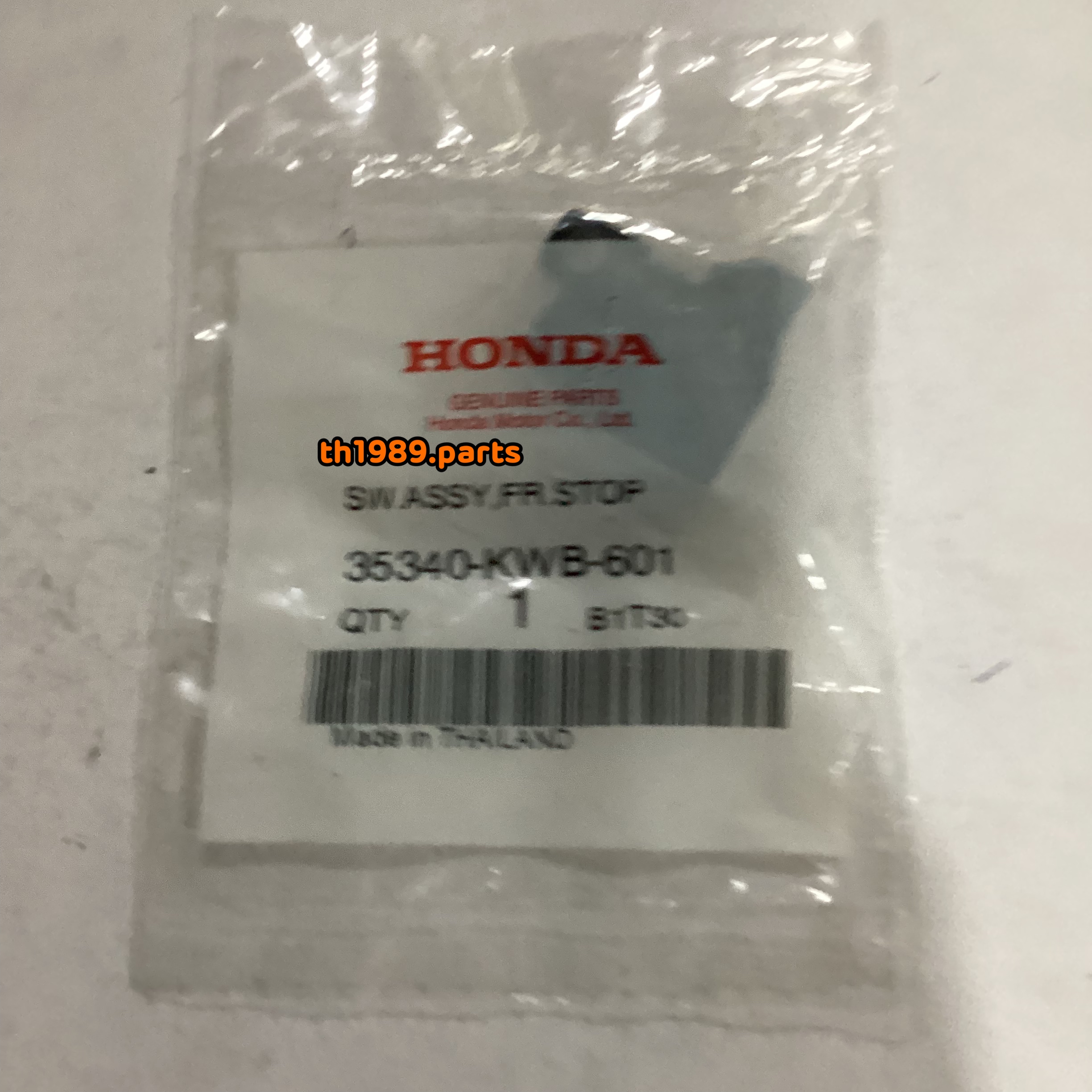 35340-KWB-601 ชุดสวิตช์ไฟเบรกหน้า WAVE110i 2012-2022 , CLICK125i 2012-2019 , ZOOMER-X 2012-2019 อะไหล่แท้ HONDA