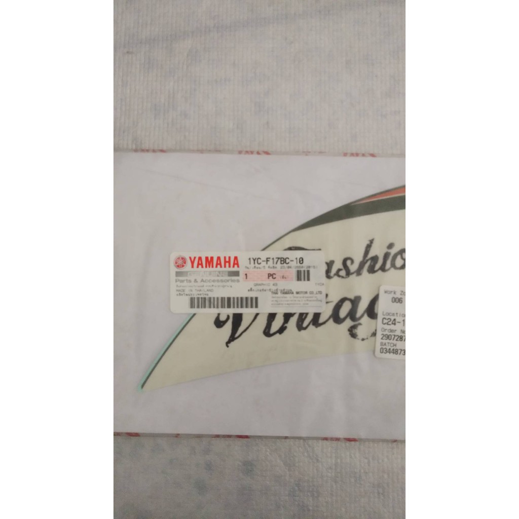 สติ๊กเกอร์ฝาข้างซ้ายตัวบน สำหรับรุ่น FINO FI อะไหล่แท้ YAMAHA 1YC-F17BC-10