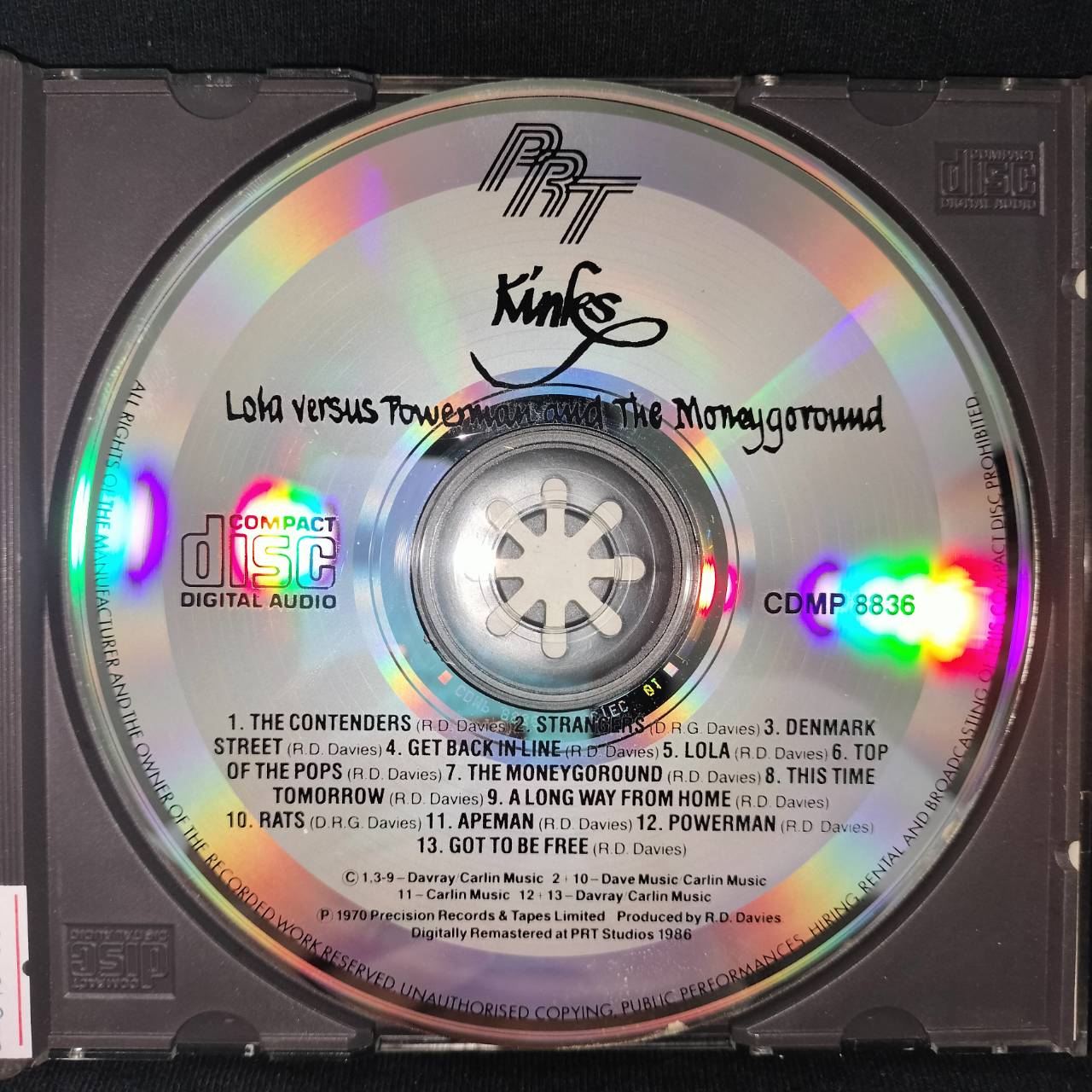 The Kinks – Kinks Part One (Lola Versus Powerman And The Moneygoround) / ไม่ระบุ / ปกมีจุดเหลือง / แผ่นดี