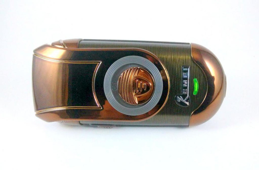 Kemei เครื่องโกนหนวดไฟฟ้าขนาดพกพา แบบชาร์จไร้สาย พร้อมที่กันจอน KM-Q788 มีใบมีดสำรอง - สีทอง