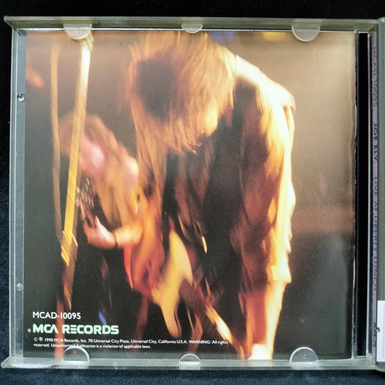 Joe Ely – Live At Liberty Lunch / USA / ปกเจาะ / แผ่นดี