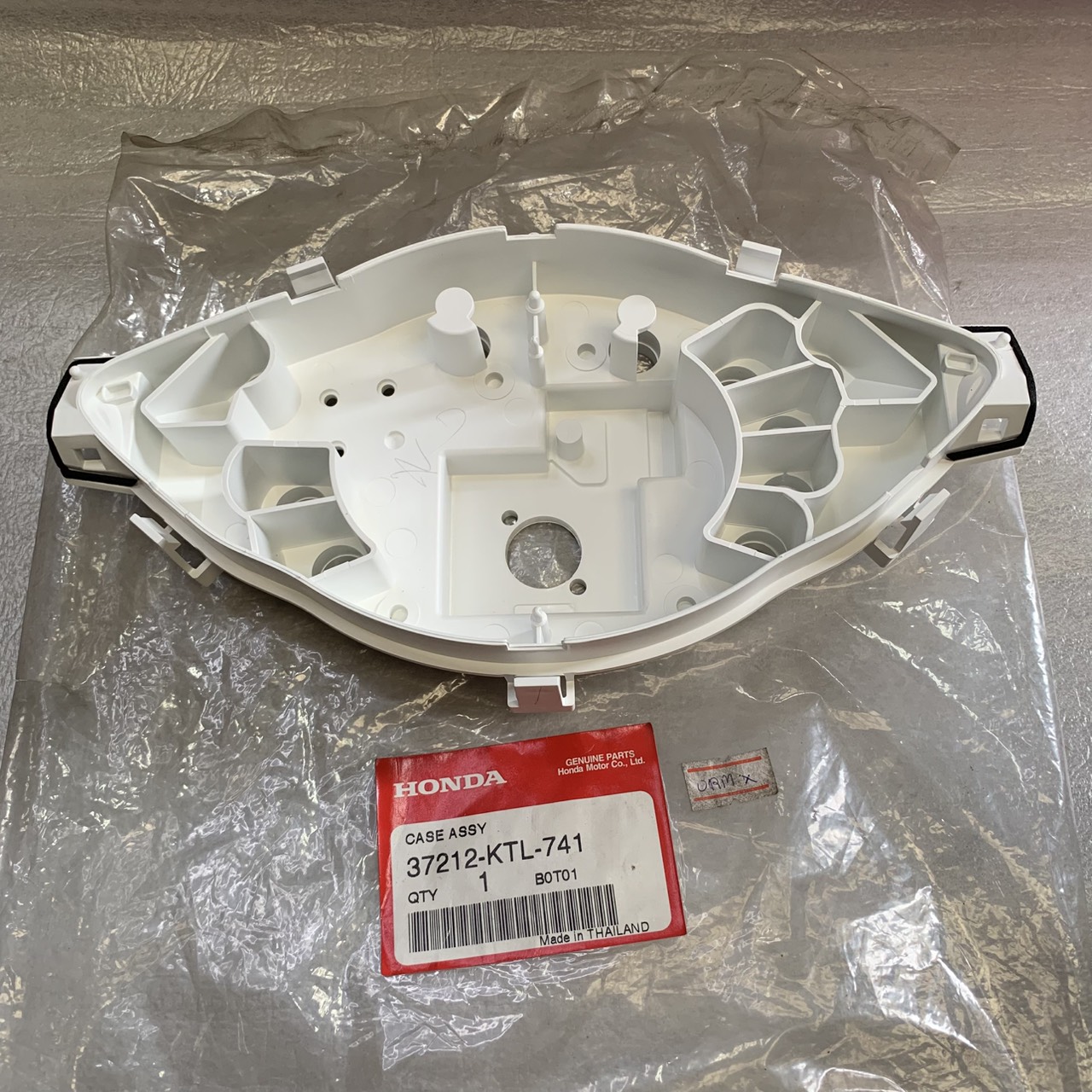 37212-KTL-741 ฝาครอบเรือนไมล์ Wave100,100S (2005) อะไหล่แท้ HONDA