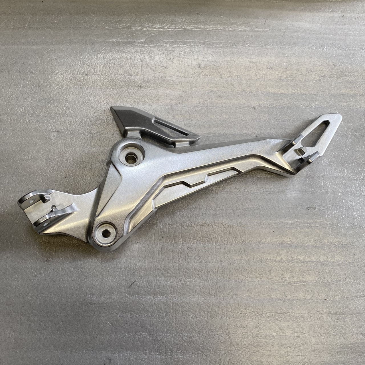 50700-K26-B00 ขายึดพักเท้าหน้าด้านซ้าย MSX125SF 2016-2020 อะไหล่แท้ HONDA