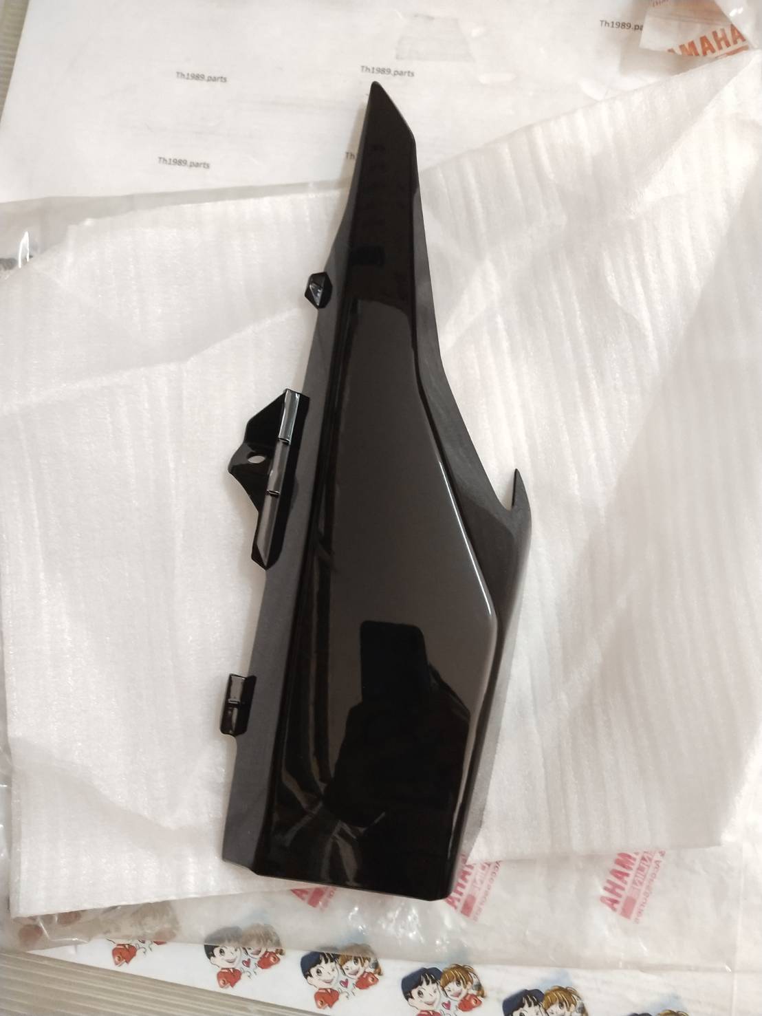 ฝาครอบไฟหน้าขวาสีดำ NOUVO SX สำหรับรุ่น AT125F NOUVO SX' 2012 อะไหล่แท้ YAMAHA 1DB-F838S-00-P0