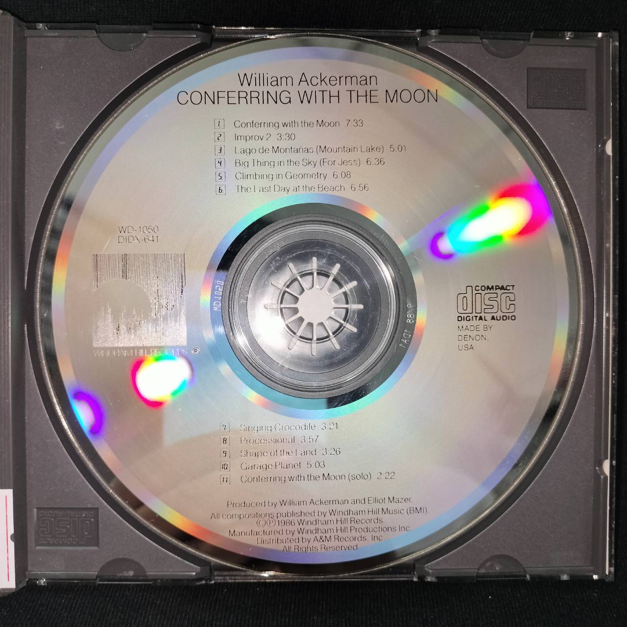 William Ackerman – Conferring With The Moon / USA / ปกมีจุดเหลือง / แผ่นดี