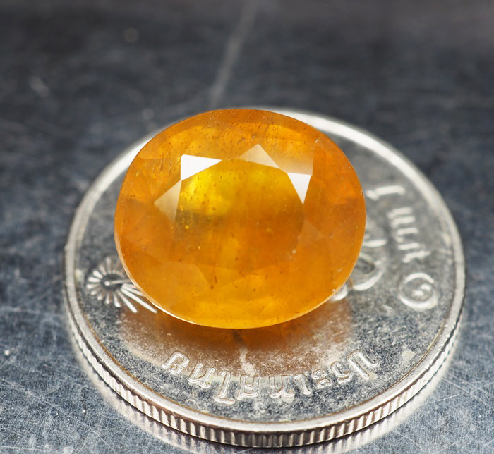 บุษราคัมอัฟริกาสีเหลืองส้ม (Sapphire) 7.50 กะรัต
