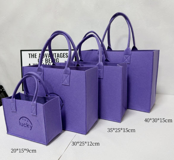 กระเป๋าถือ,กระเป๋าถือผ้าสักหลาด,กระเป๋าผ้าสักหลาด,กระเป๋าถือผ้าสักหลาด,สกรีนโลโก้,ผลิตตามแบบ