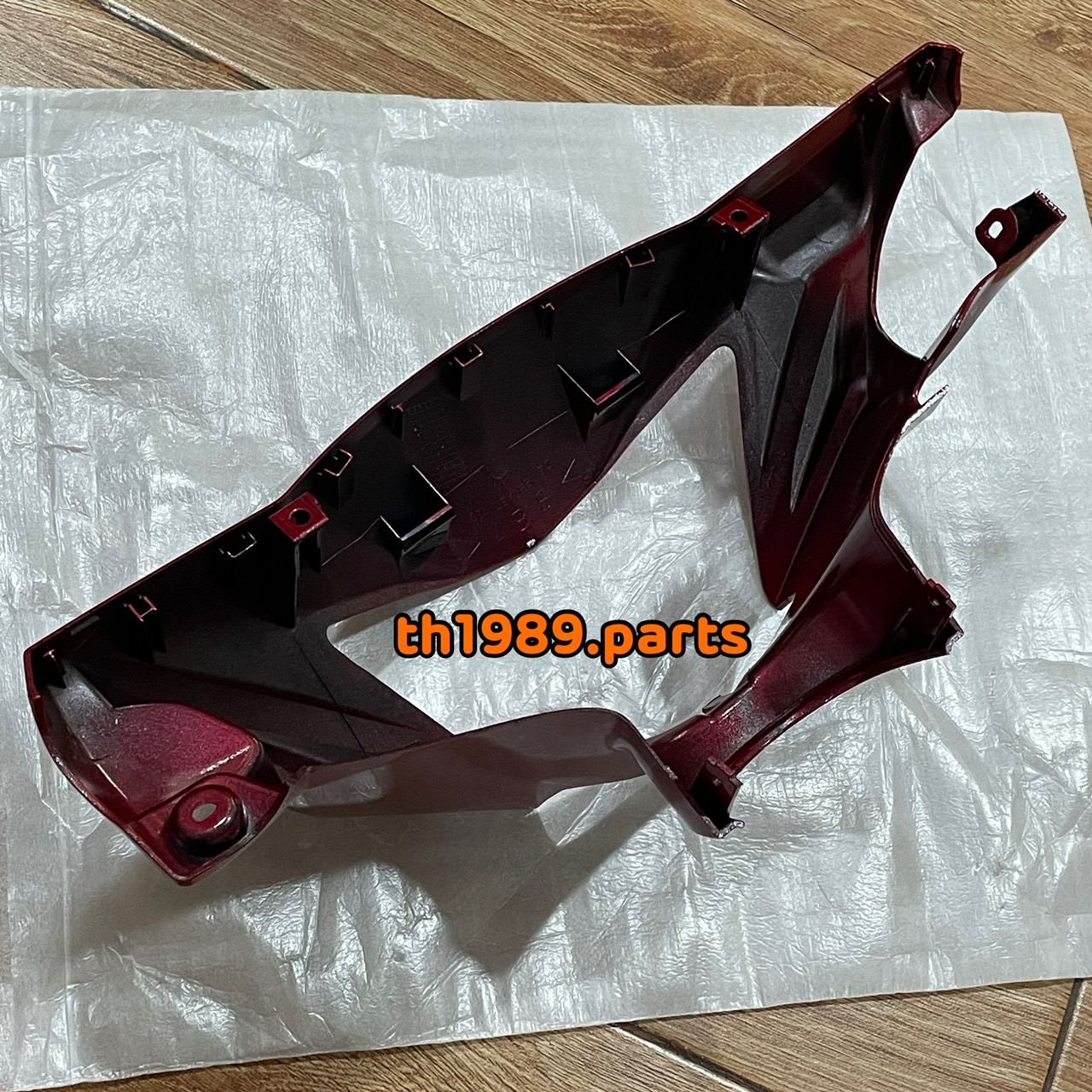 ฝาครอบไฟหน้า สีแดงบรอนซ์ SPARK135 อะไหล่แท้ YAMAHA 5YP-F6143-00-P1