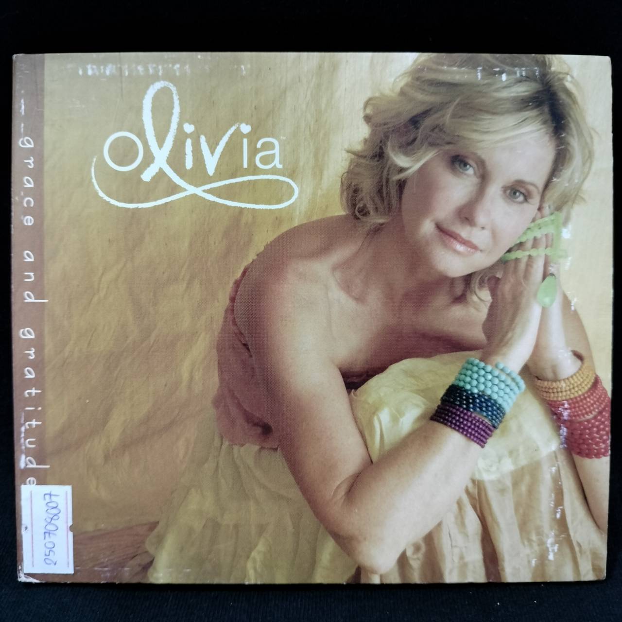 Olivia Newton-John – Grace And Gratitude / ไม่ระบุ / ปกเก่าเก็บ / มีรอยบ้าง