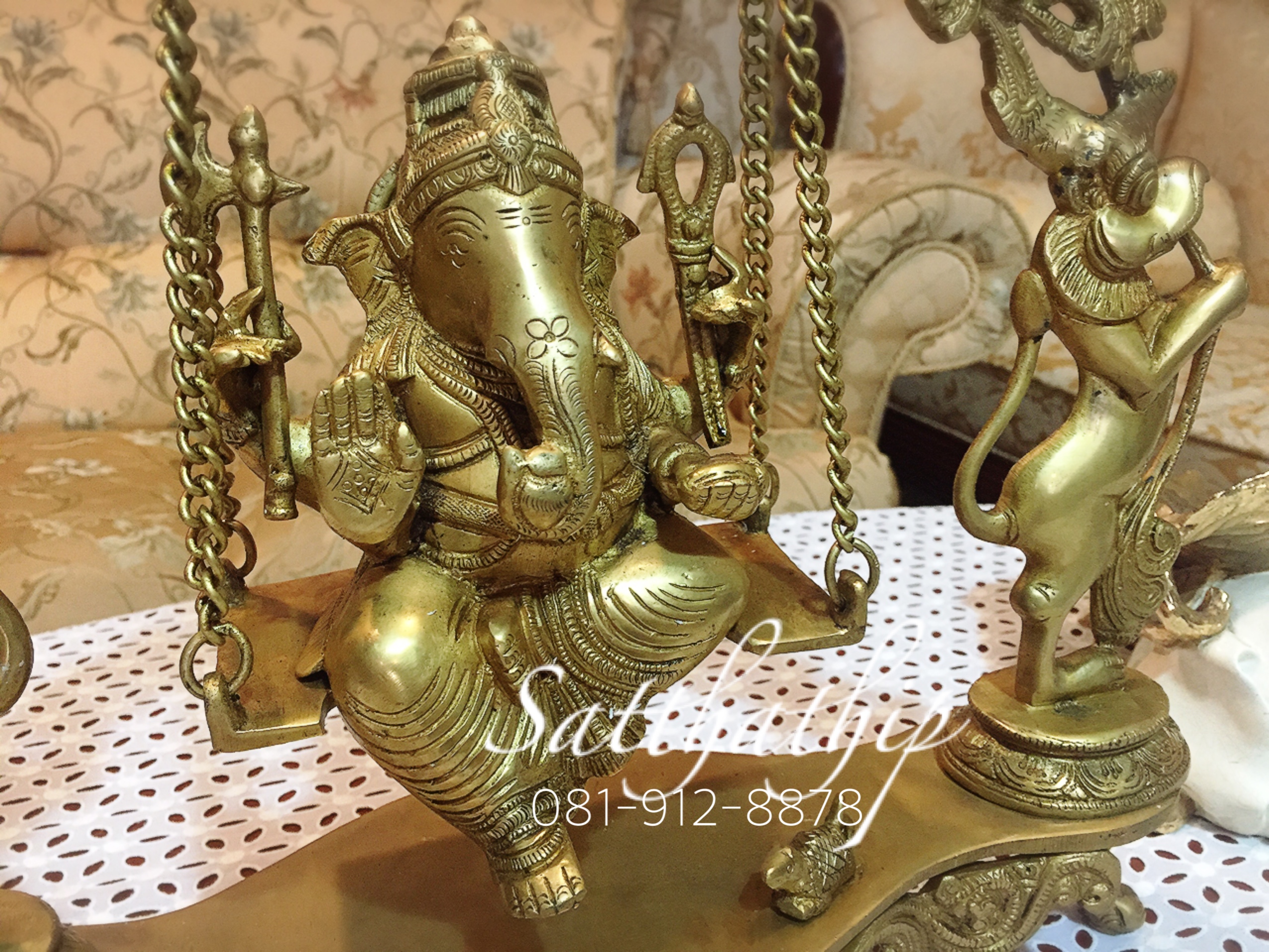 พระพิฆเนศปางโล้ชิงช้า นั่งชิงช้า (ทองเหลือง) ผลิตและนำเข้าจากอินเดีย - Ganesha: Lord of Success