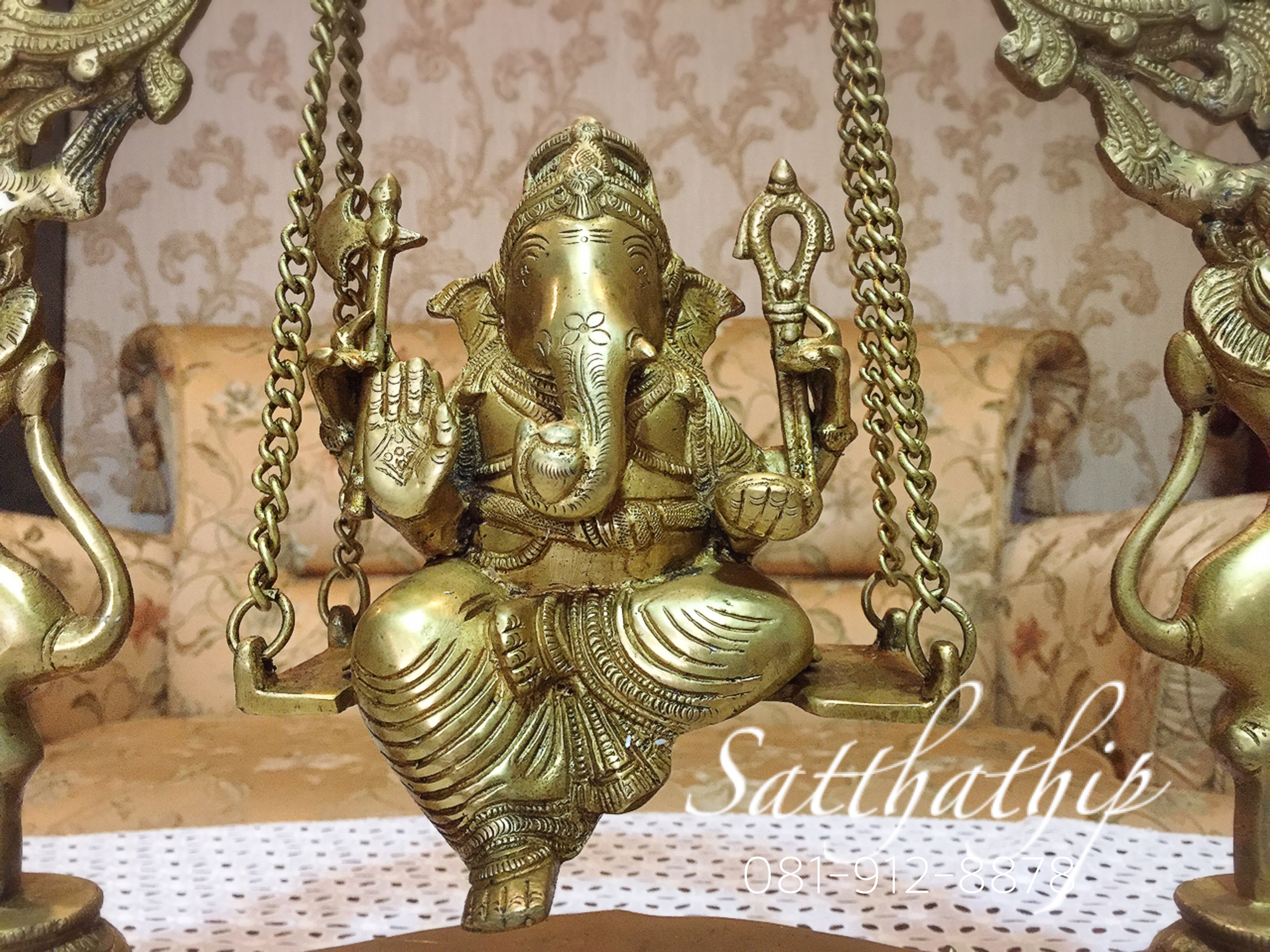 พระพิฆเนศปางโล้ชิงช้า นั่งชิงช้า (ทองเหลือง) ผลิตและนำเข้าจากอินเดีย - Ganesha: Lord of Success