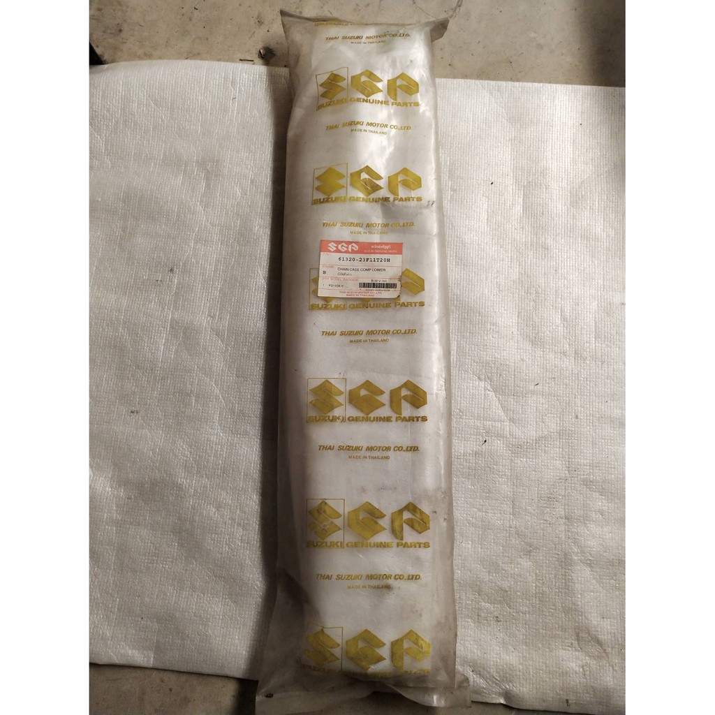 บังโซ่ตัวล่าง สำหรับรุ่น Best 110 FD110X-Y ไฟเดียว อะไหล่แท้ SUZUKI 61320-23F11T20H