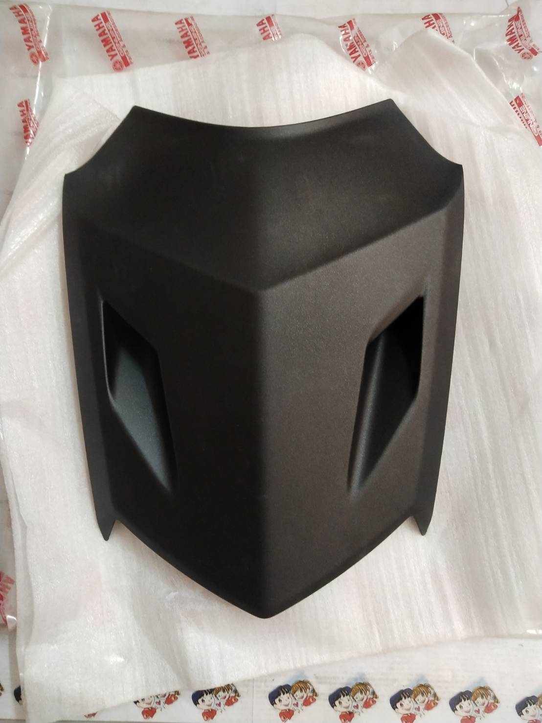 ฝาครอบไฟหน้าสีดำด้าน NOUVO SX สำหรับรุ่น AT125F NOUVO SX' 2012 อะไหล่แท้ YAMAHA 1DB-F838E-00-P0