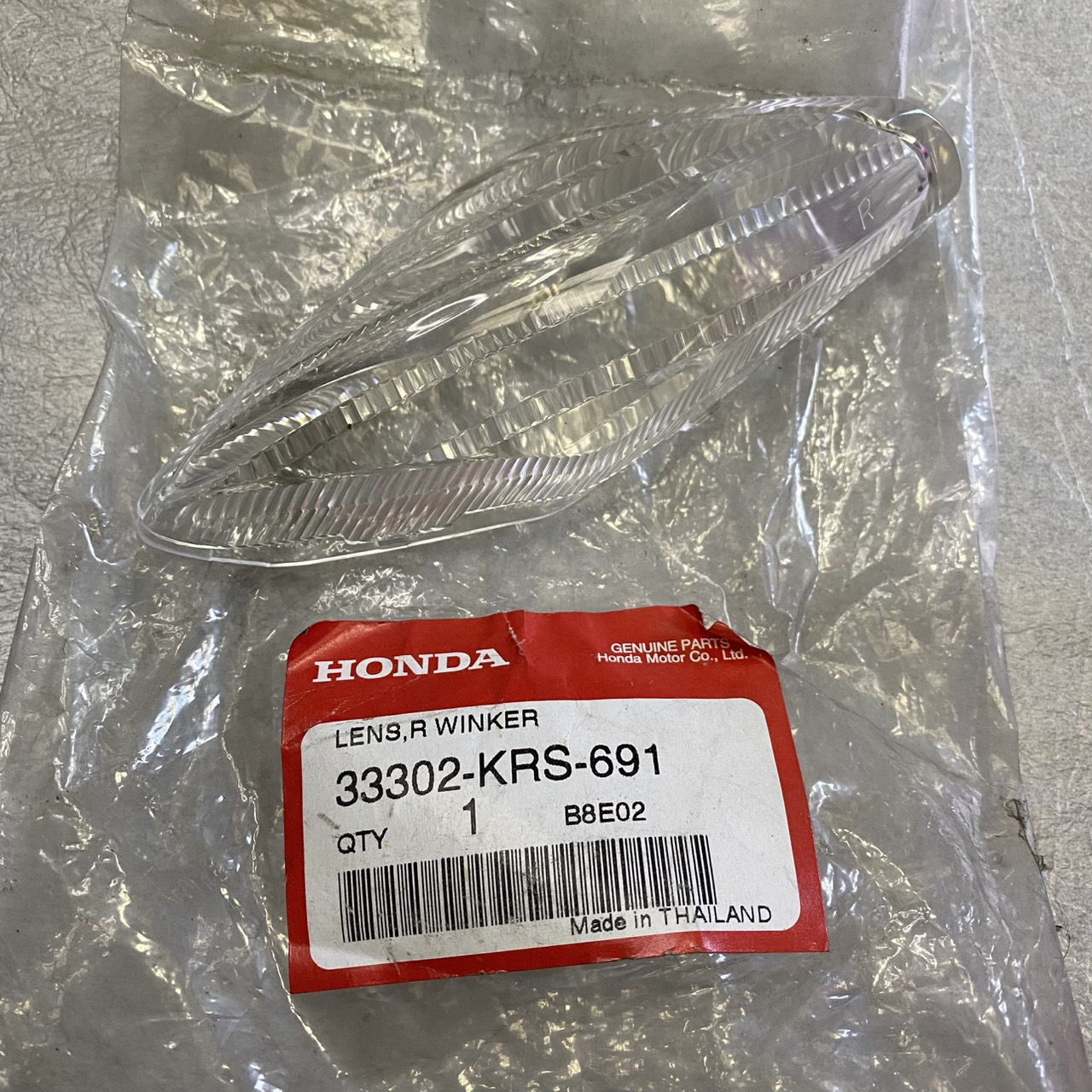 33302-KRS-691 เลนส์ไฟเลี้ยวหน้าขวา WAVE100 อะไหล่แท้ HONDA