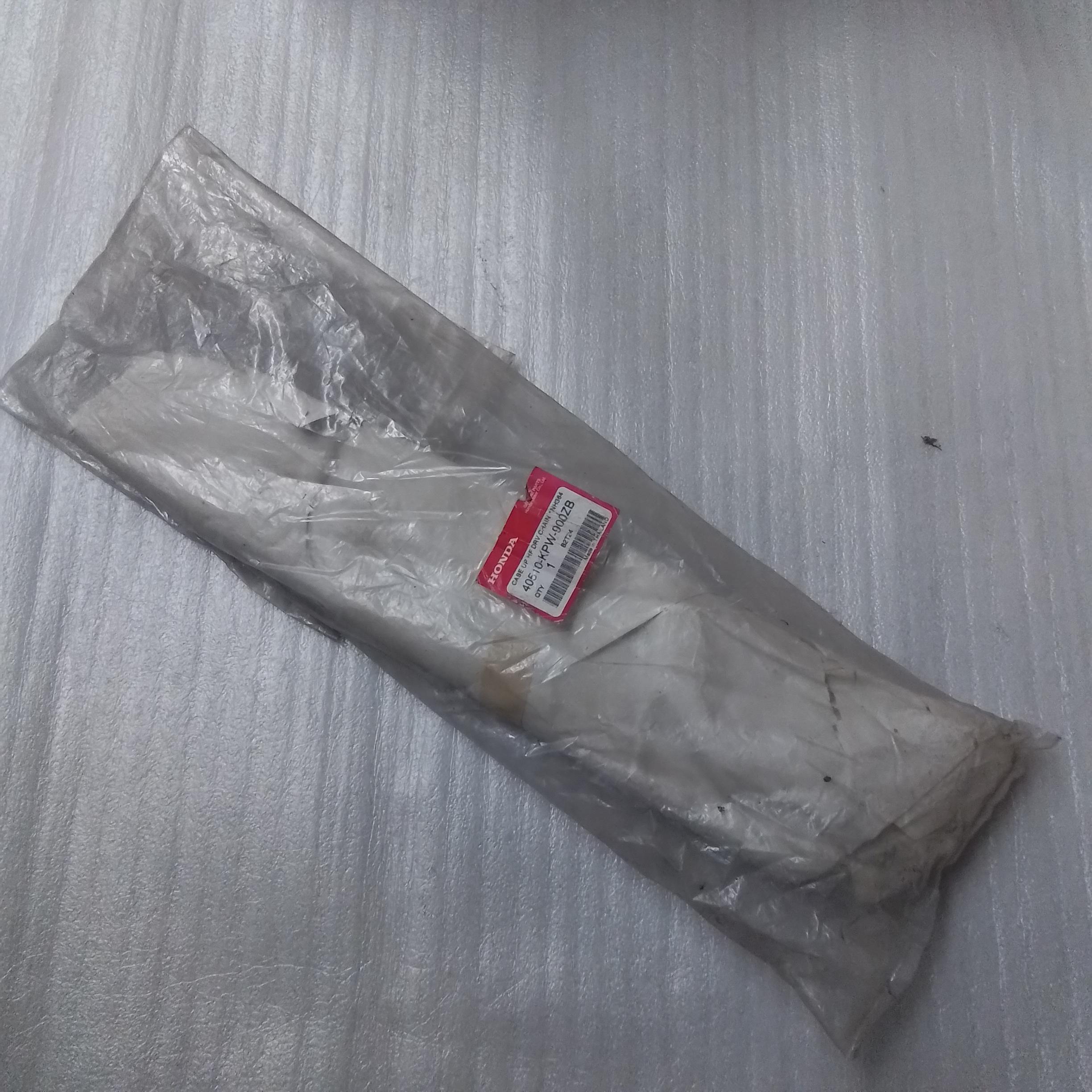 40510-KPW-900ZB บังโซ่บนสีบรอนซ์ DREAM125 2002-2007 อะไหล่แท้ HONDA