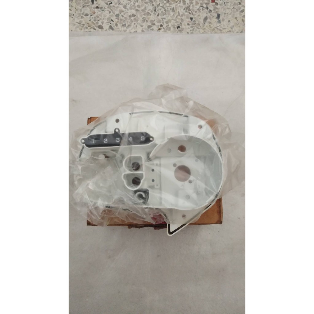37212-KAN-T20 ฝาครอบเรือนไมล์ตัวล่าง TENA 5 เกียร์ อะไหล่แท้ HONDA