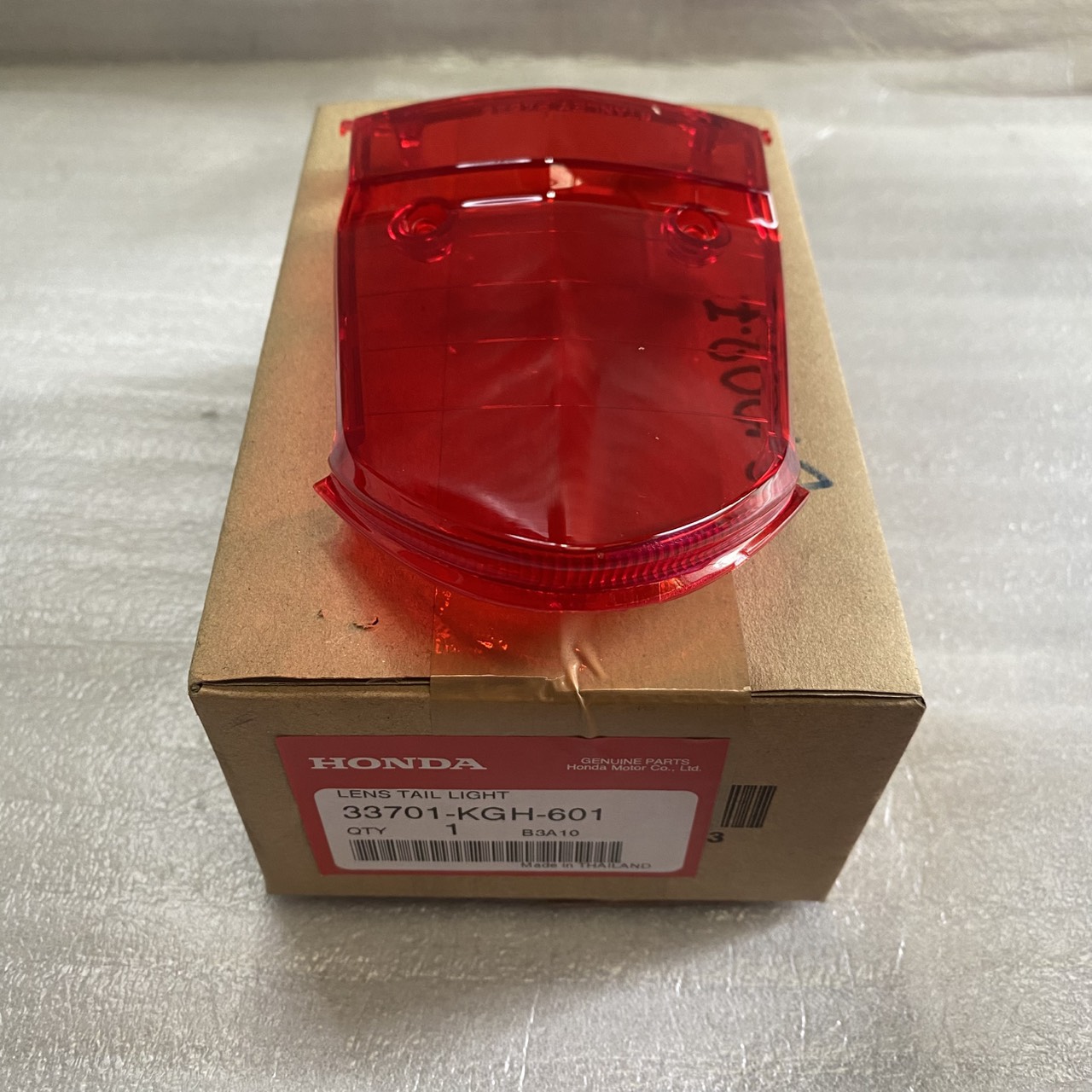 33701-KGH-601 เลนส์ไฟท้าย SONIC125C,MC SONIC(2004) อะไหล่แท้ HONDA