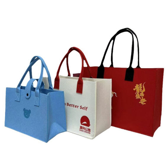 กระเป๋าถือ,กระเป๋าถือผ้าสักหลาด,กระเป๋าผ้าสักหลาด,กระเป๋าถือผ้าสักหลาด,สกรีนโลโก้,ผลิตตามแบบ