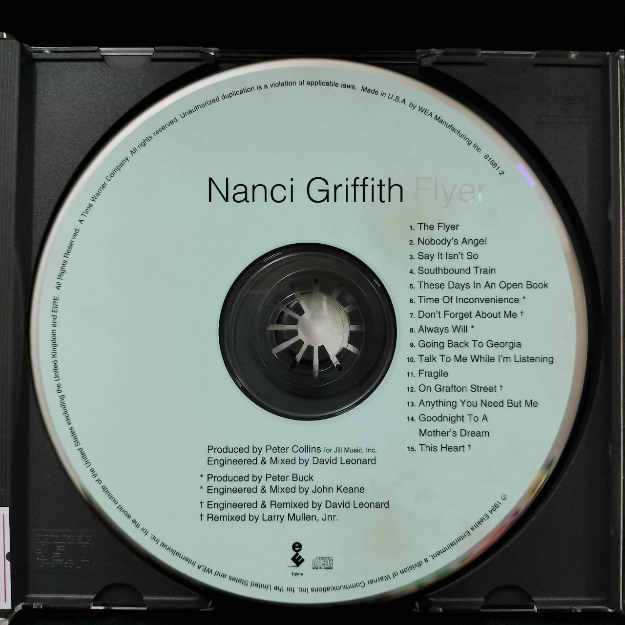 Nanci Griffith – Flyer / USA / ฝากล่องหัก / แผ่นด้านสกรีนมีคราบเหลือง / แผ่นเป็นรอย