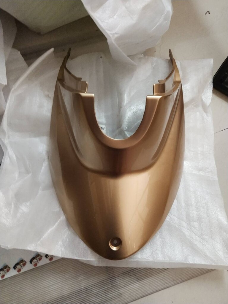 ฝาครอบใต้เบาะสีน้ำตาลทอง สำหรับรุ่น FINO' 2010 อะไหล่แท้ YAMAHA 4D0-F172W-00-P9