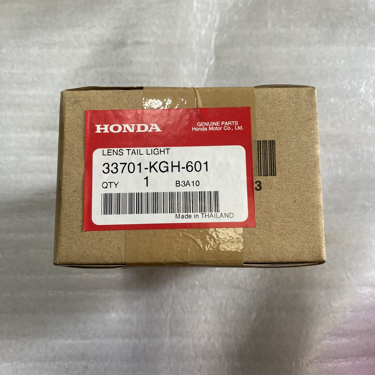 33701-KGH-601 เลนส์ไฟท้าย SONIC125C,MC SONIC(2004) อะไหล่แท้ HONDA