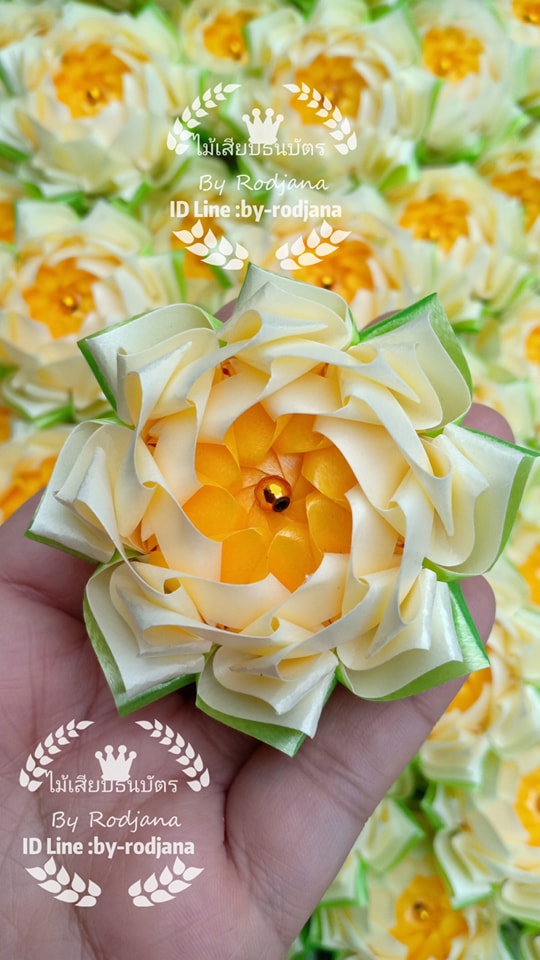 เหรียญโปรยทาน : ดอกบัวฉลองขวัญ