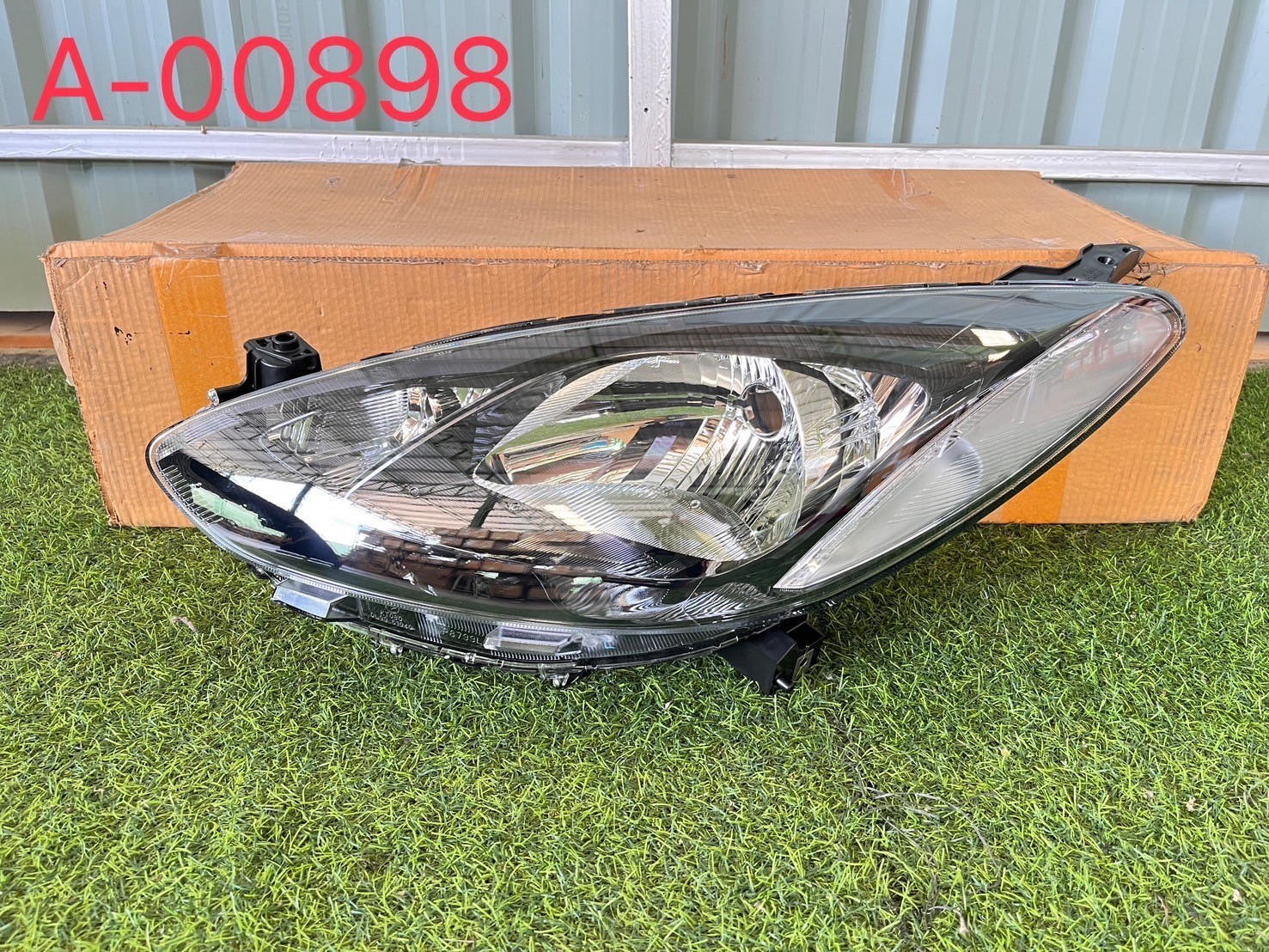 ไฟหน้า L Mazda2 2009-14 ใหม่แท้