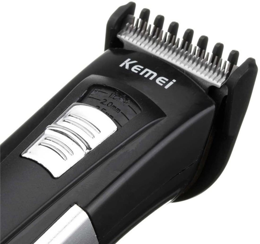 Kemei ปัตตาเลี่ยนตัดผมไร้สายแบบชาร์จ KM-3006A ใบมีดสแตนเลส มอเตอร์ Pd Alloy มีแบตสำรอง พร้อมหวีรองตัดและแท่นวาง - สีดำ