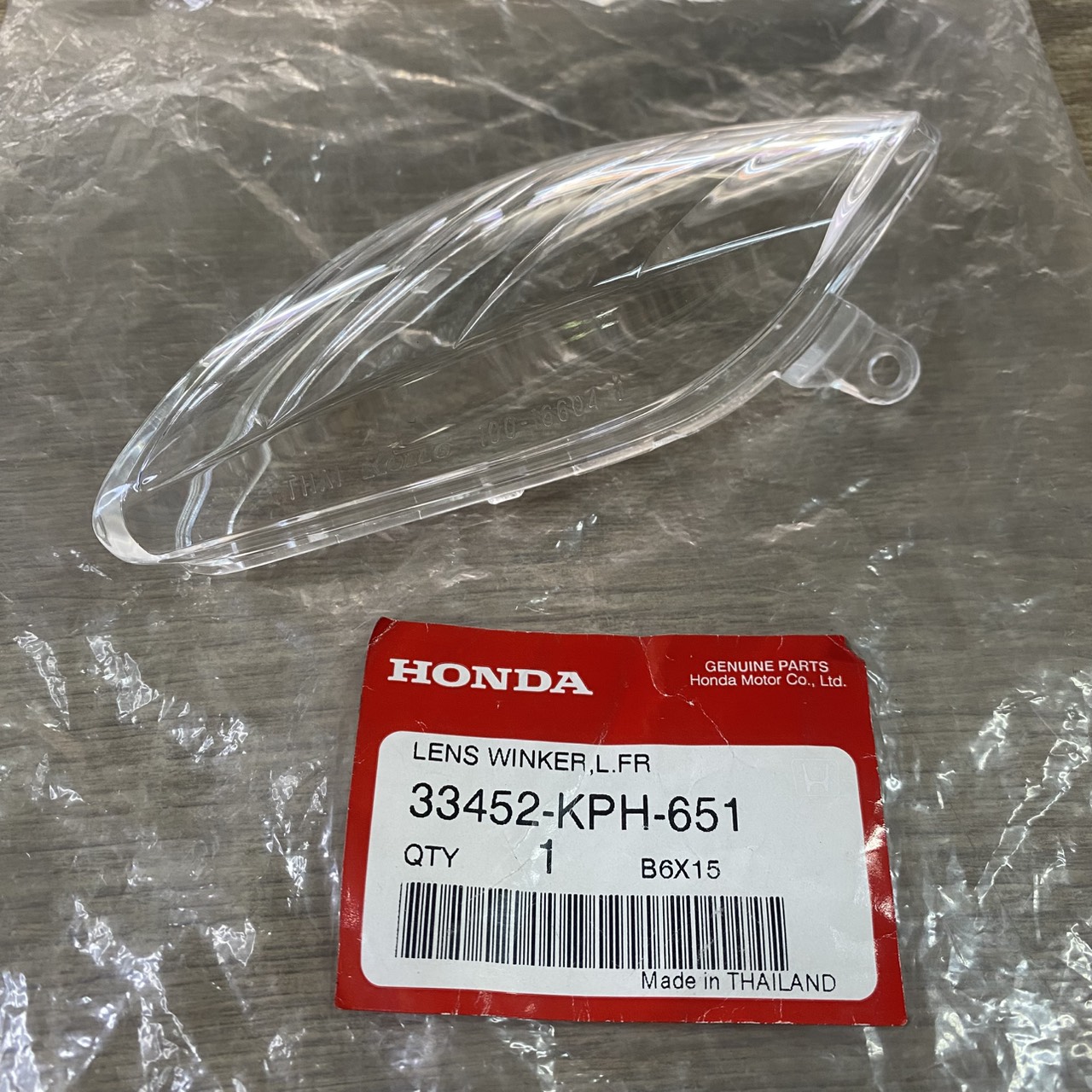 33452-KPH-651 เลนส์ไฟเลี้ยวหน้าซ้าย WAVE125R 2005 อะไหล่แท้ HONDA