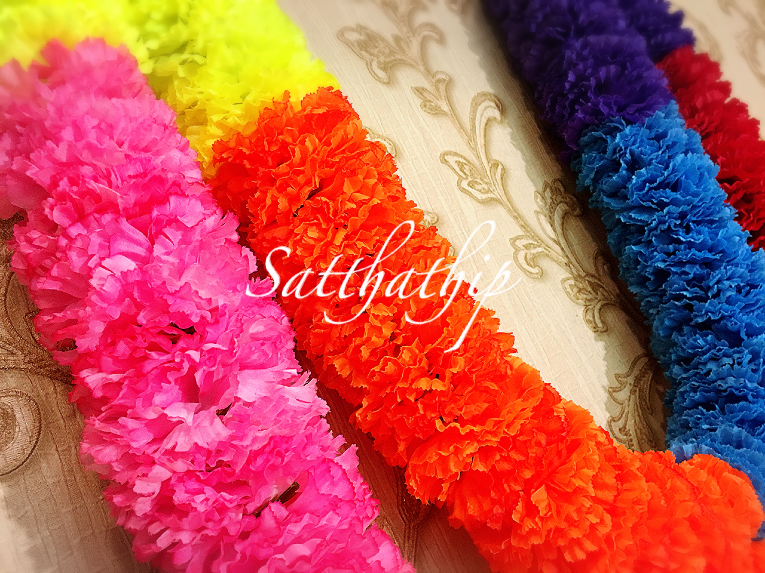 พวงมาลัยเจ็ดสีเจ็ดศอก/พวงมาลัยผ้าสองชาย [แบบตัดก้านดอก ร้อยแน่น 450 บาท/เมตร]