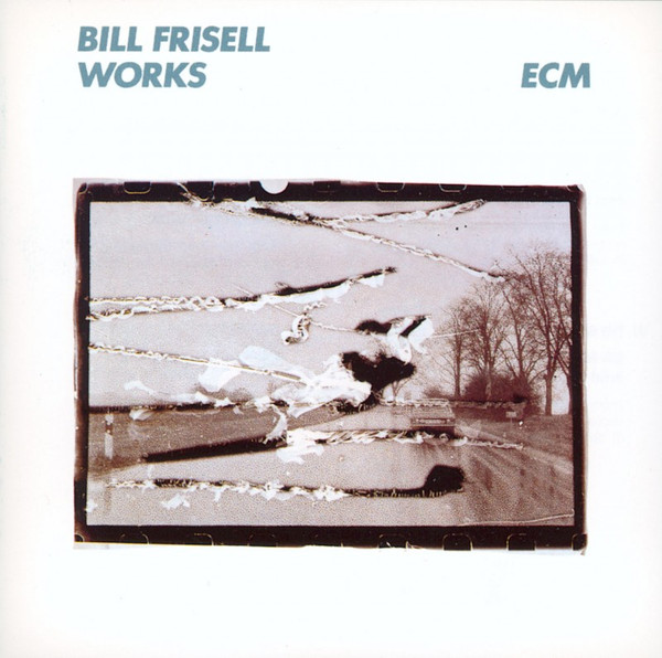 Bill Frisell – Works / USA / ค่าย ECM / ปกมีจุดเหลือง / แผ่นดี