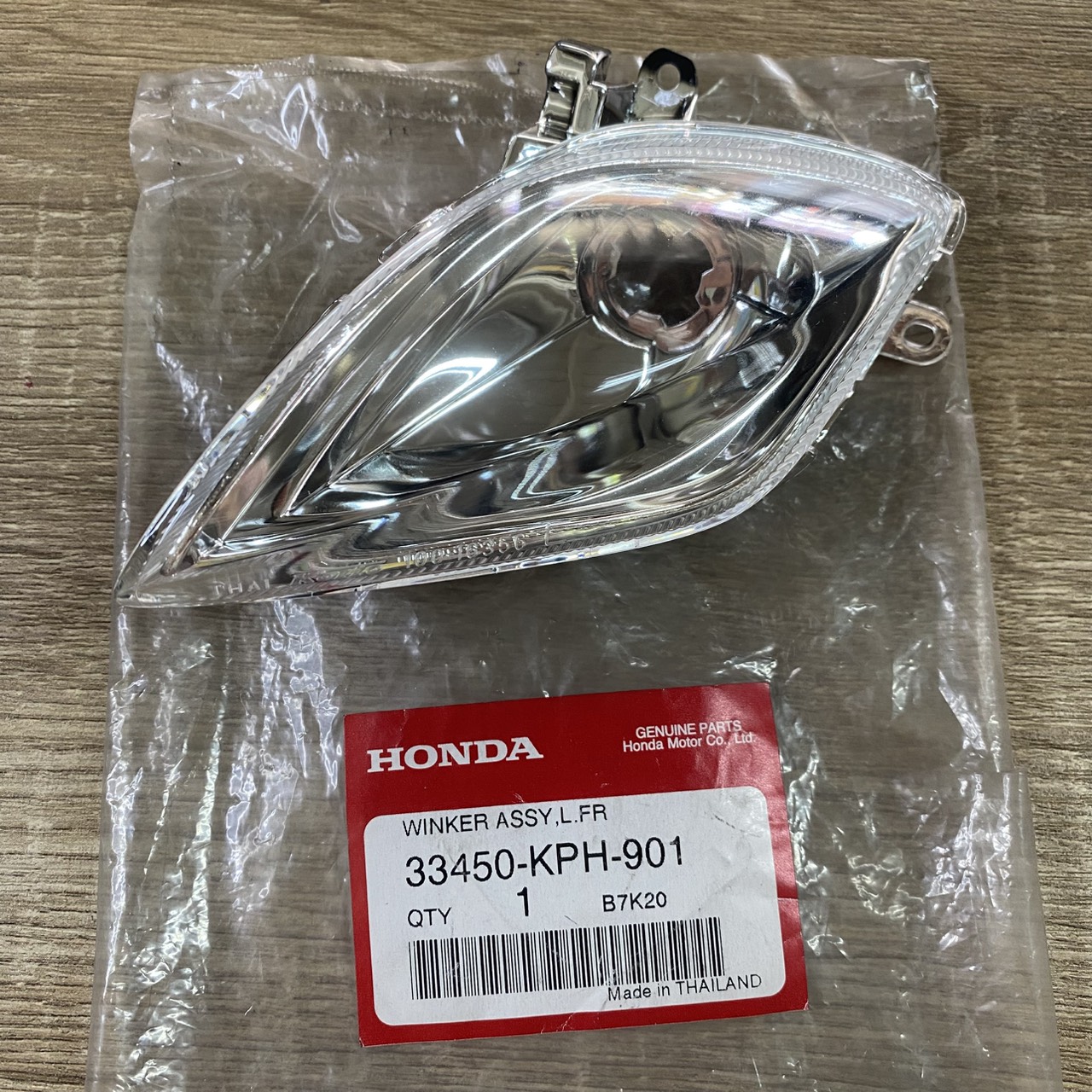 33450-KPH-901 ชุดตัวเรือนไฟเลี้ยวหน้าซ้าย WAVE125D WAVE125i(2004) อะไหล่แท้ HONDA