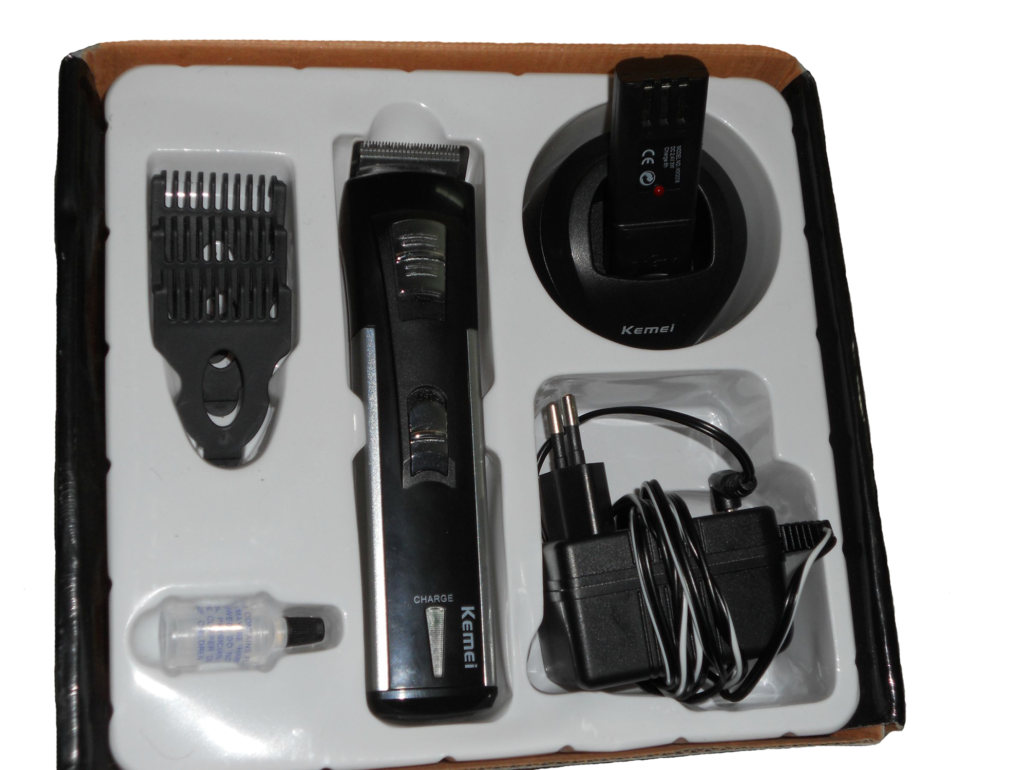 Kemei ปัตตาเลี่ยนตัดผมไร้สายแบบชาร์จ KM-3006A ใบมีดสแตนเลส มอเตอร์ Pd Alloy มีแบตสำรอง พร้อมหวีรองตัดและแท่นวาง - สีดำ