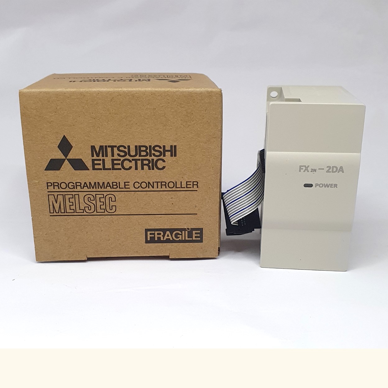 PLC Mitsu รุ่น FX2N-2DA, Analog Output, 2 Output FX2N-2DA สามารถเชื่อมต่อกับ FX0N, FX1N, FX2N, FX2NC, FX3G, FX3GC, FX3U และซีรีส์ FX3UC Made in China (FX2N-2DA)