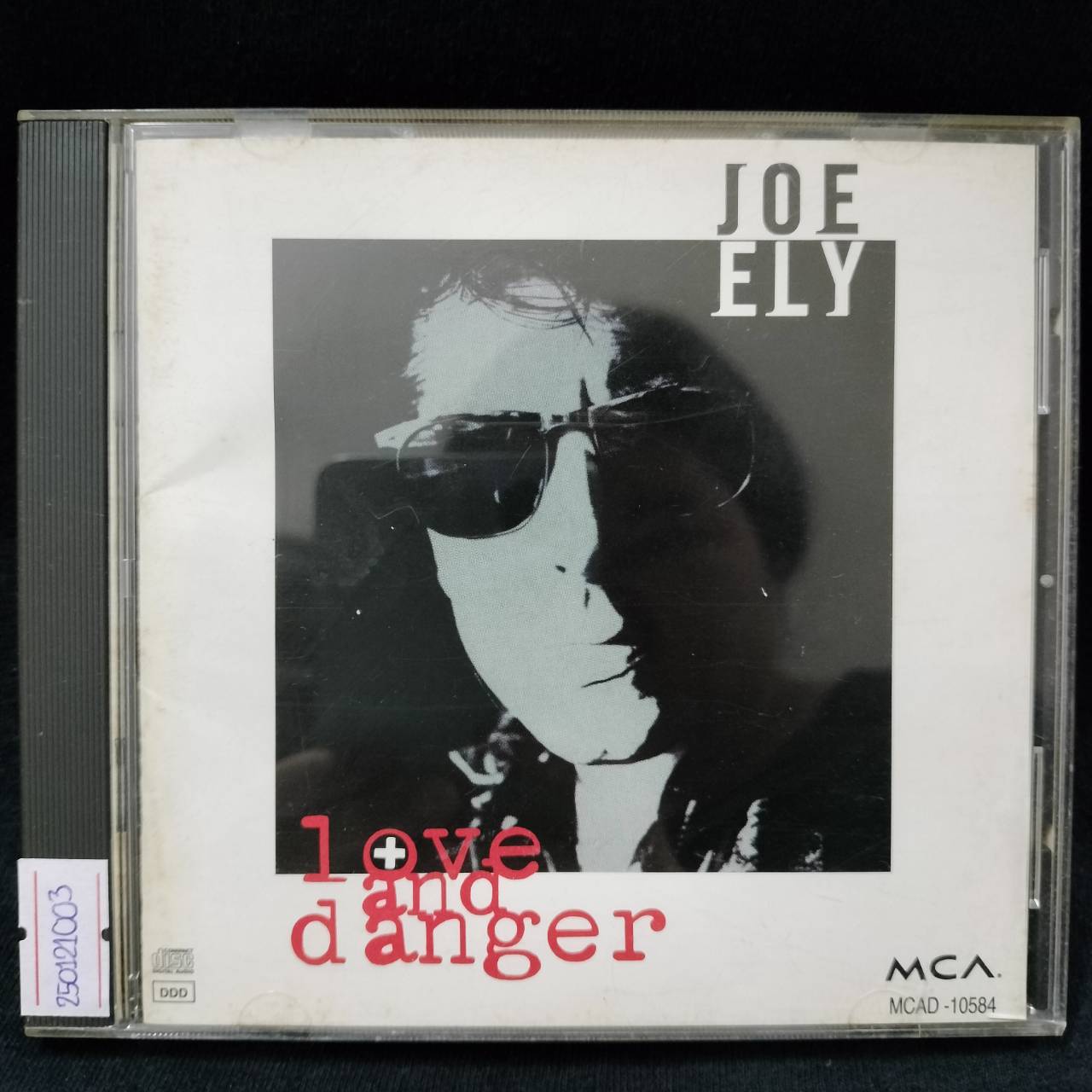 Joe Ely – Love And Danger / USA / ปกเก่าเก็บ / ปกเจาะ / แผ่นดี