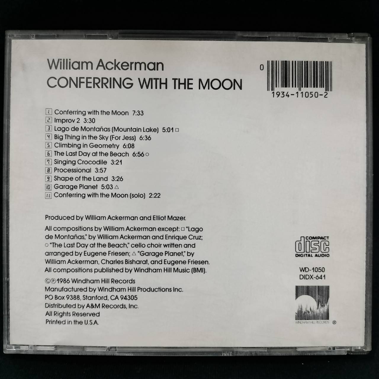 William Ackerman – Conferring With The Moon / USA / ปกมีจุดเหลือง / แผ่นดี