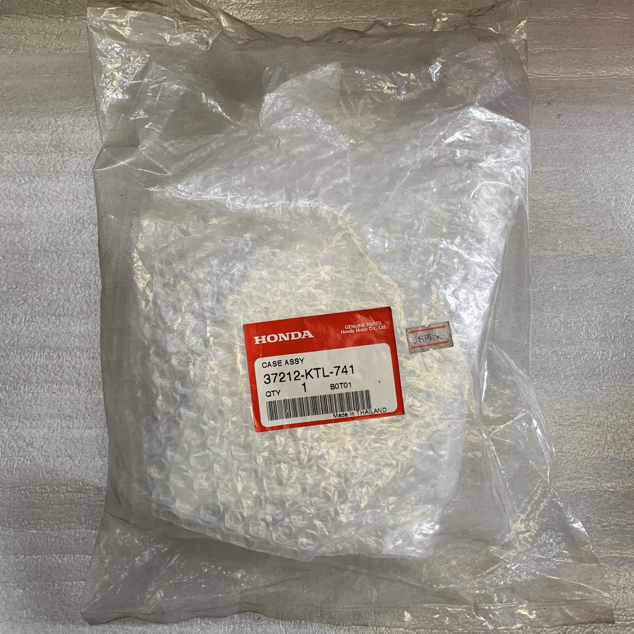 37212-KTL-741 ฝาครอบเรือนไมล์ Wave100,100S (2005) อะไหล่แท้ HONDA