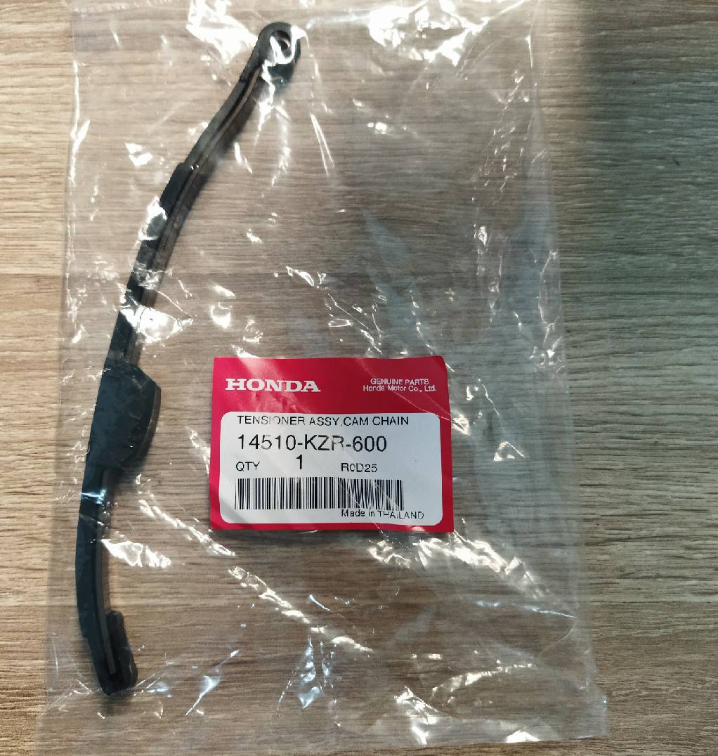ยางกดโซ่ราวลิ้น สำหรับรุ่น PCX150 อะไหล่แท้ HONDA 14510-KZR-600