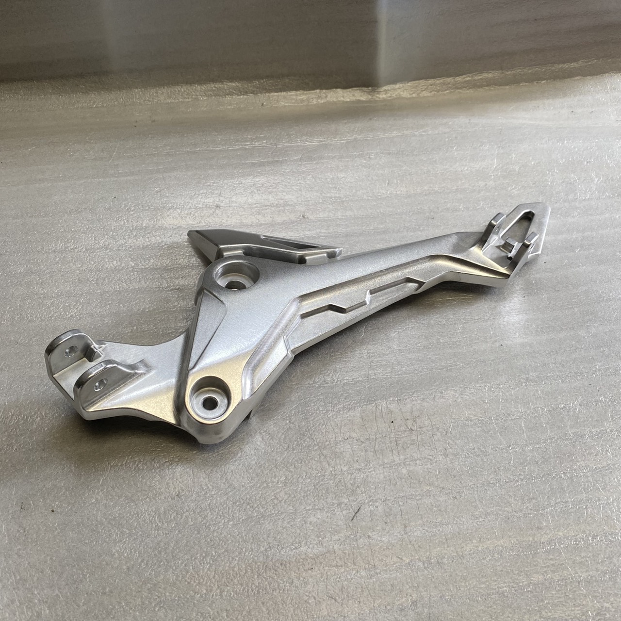 50700-K26-B00 ขายึดพักเท้าหน้าด้านซ้าย MSX125SF 2016-2020 อะไหล่แท้ HONDA