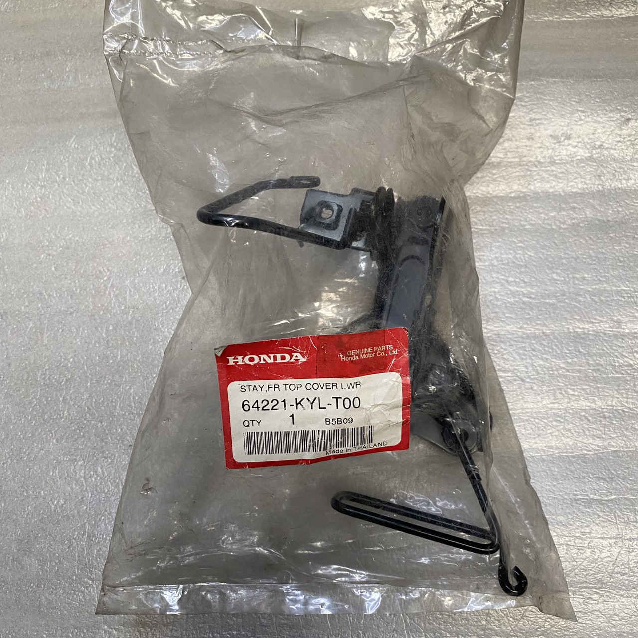 64221-KYL-T00 ขายึดฝาครอบไฟหน้า WAVE125I NF125MC(C) อะไหล่แท้ HONDA