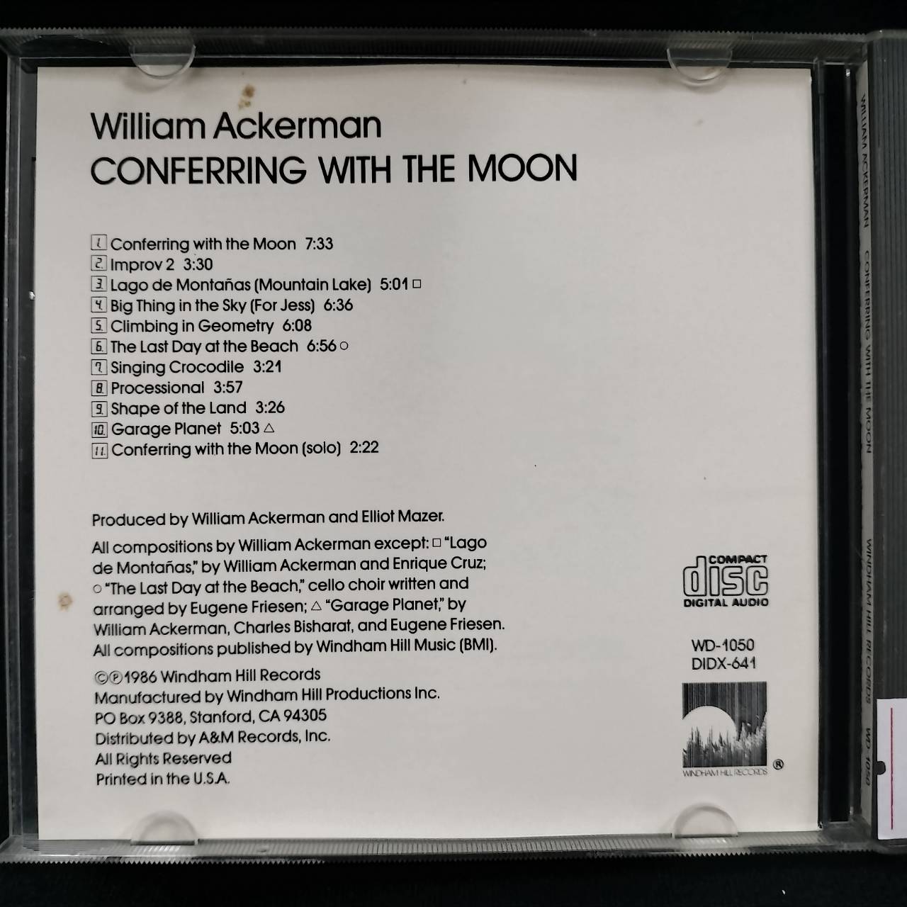 William Ackerman – Conferring With The Moon / USA / ปกมีจุดเหลือง / แผ่นดี