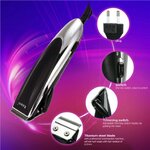 Kemei ปัตตาเลี่ยนตัดผมแบบมีสาย 10 W สำหรับช่างมืออาชีพ KM-1500 ใบมีดสแตนเลส มีครีบปรับได้ 0.1-3 mm ตัดคม แม่นยำ เครื่องไม่ร้อนง่าย พร้อมหวีรอง - สีดำ