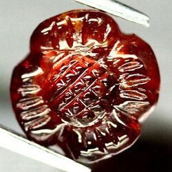 พลอยสเปคซาร์ไทร์โกเมนส้ม 5.40 กะรัตแกะลายดอกไม้