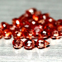 พลอยโรโดไรท์แดง 5.06 กะรัต 25 ชิ้นเจาะรูแล้ว