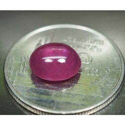 พลอยทับทิมหลังเบี้ย 2.55 กะรัตสวยสีม่วงแดง